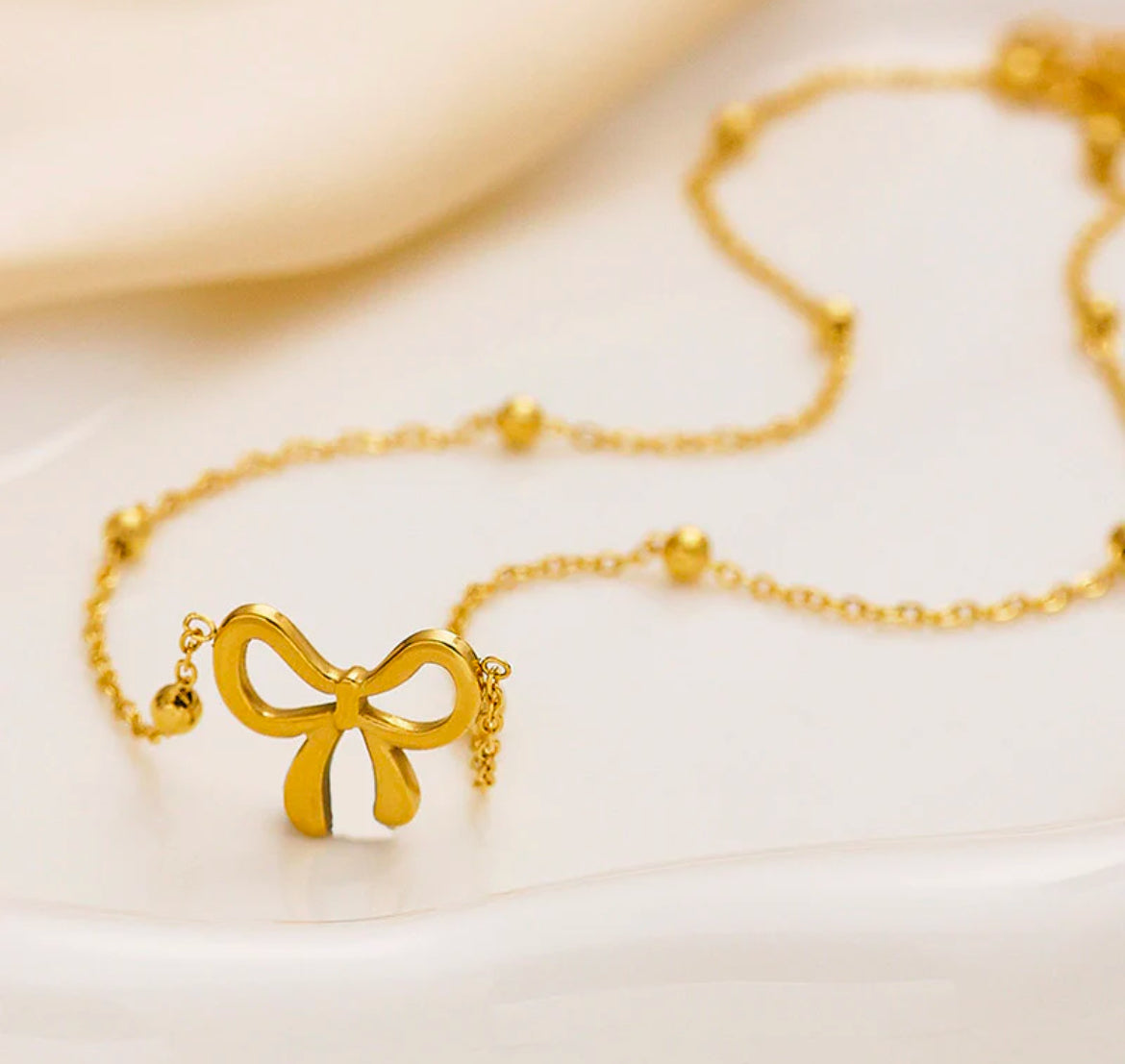 Gold Plated Anti Tarnish Infinity Bow Pendant