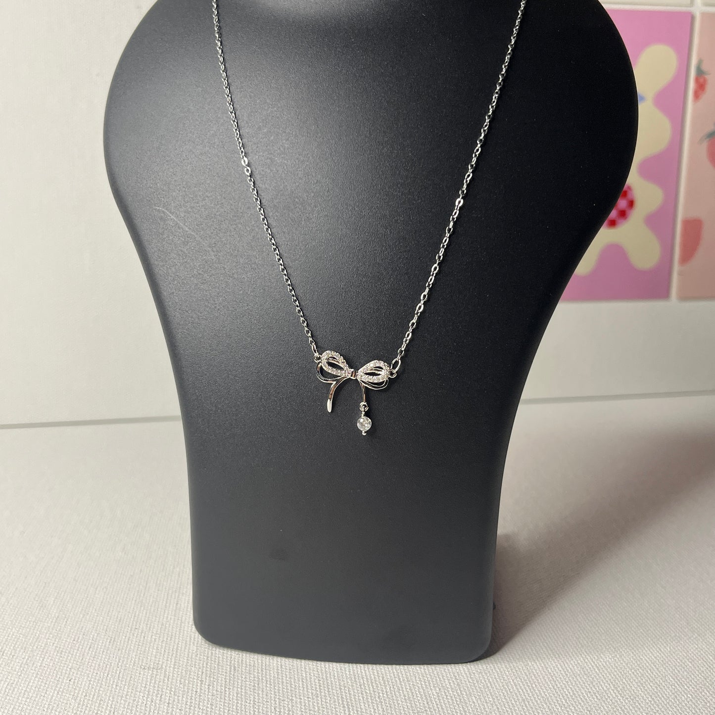 Silver Plated American Diamond Studded Infinity Bow Korean Pendant