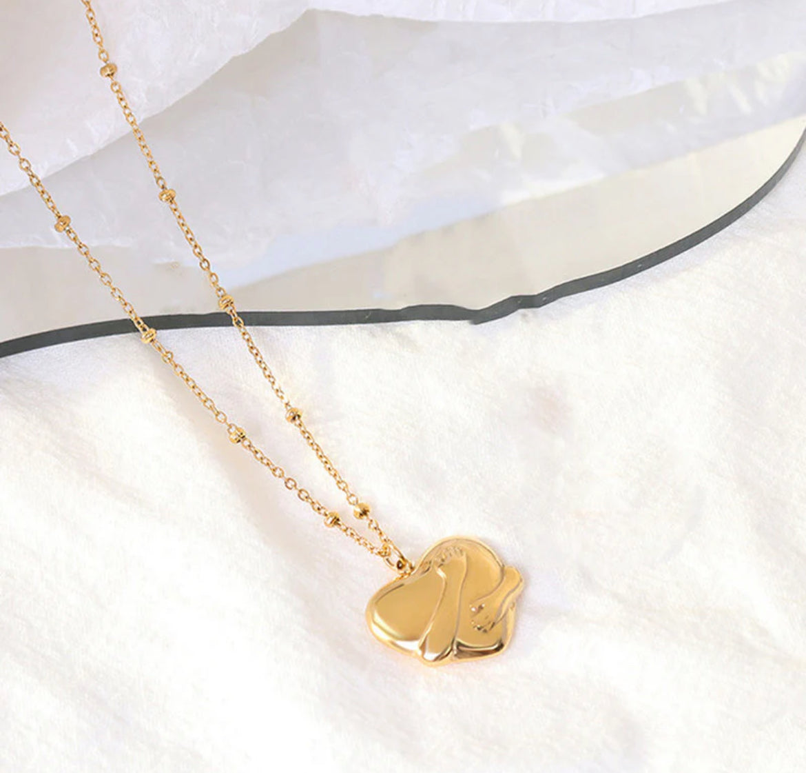Viral Gold-Plated Anti Tarnish Heart Hug Themed Pendant