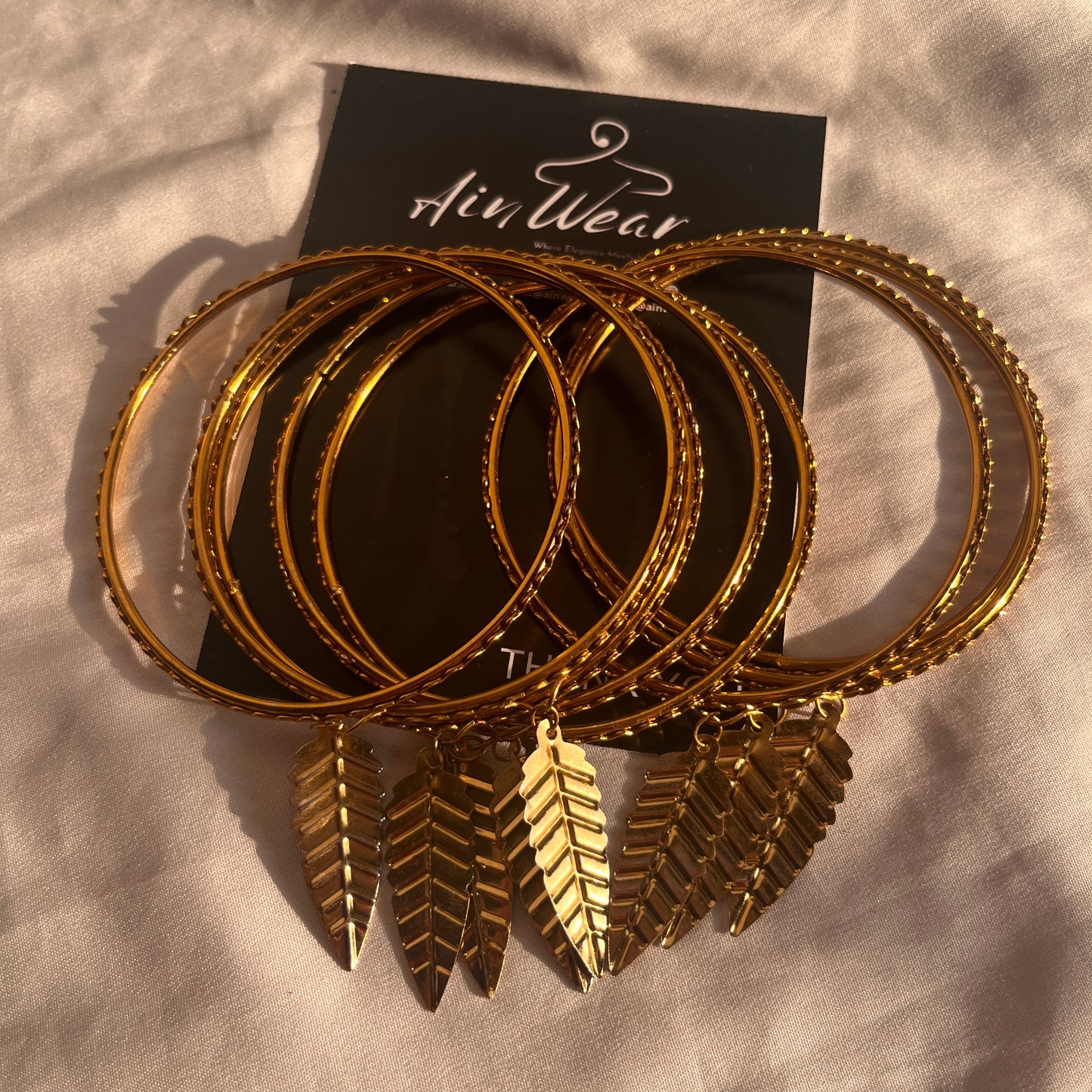 Golden Traditional Bangles With Latkan (Set Of 8 Bangles)