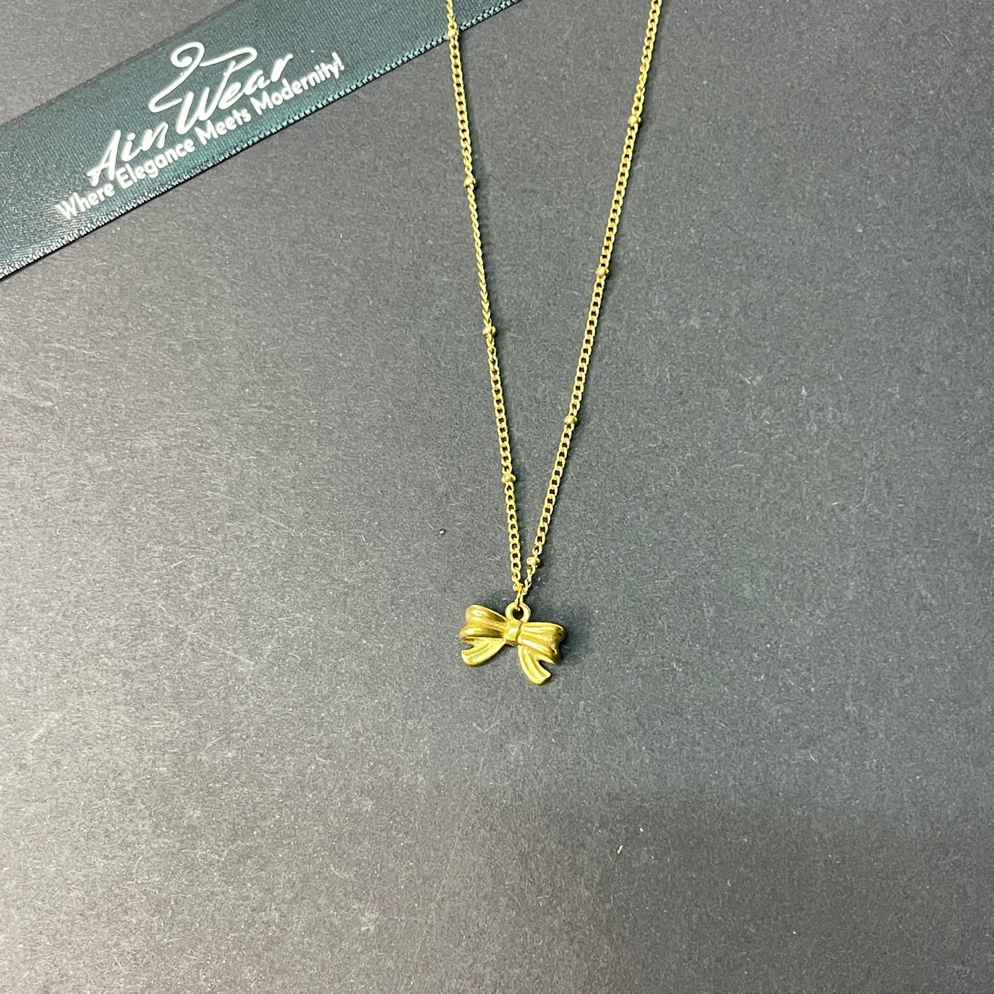 Gold Plated Stainless Steel Anti Tarnish Bow Themed Pendant