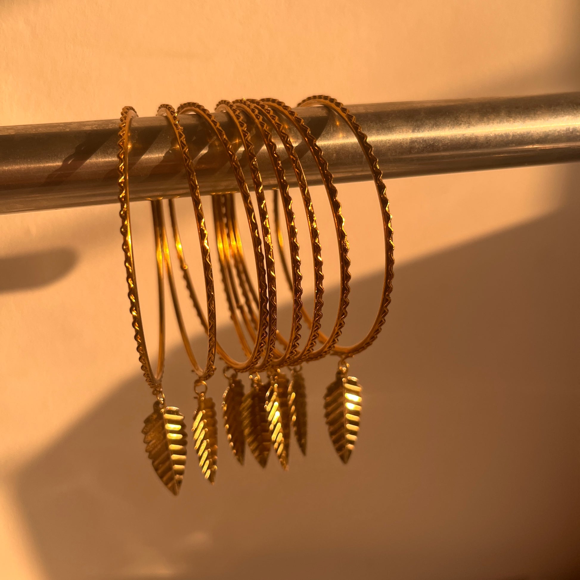 Golden Traditional Bangles With Latkan (Set Of 8 Bangles) Ain Wear - Where Elegance Meets Modernity!
