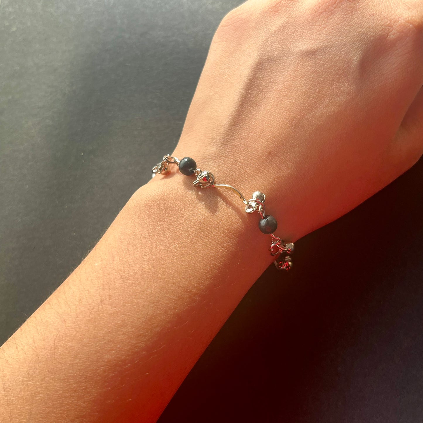 Silver & Black Adjustable Bracelet Ain Wear - Where Elegance Meets Modernity!