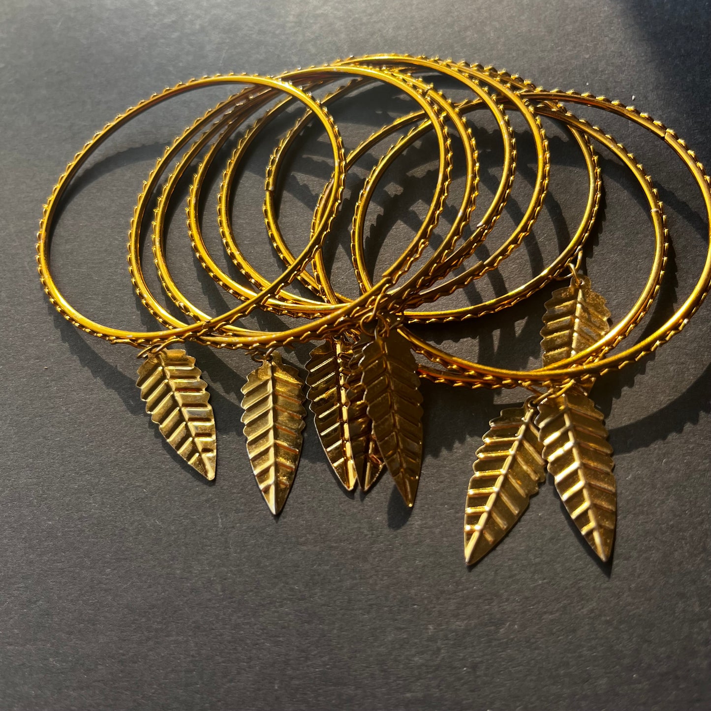 Golden Traditional Bangles With Latkan (Set Of 8 Bangles)
