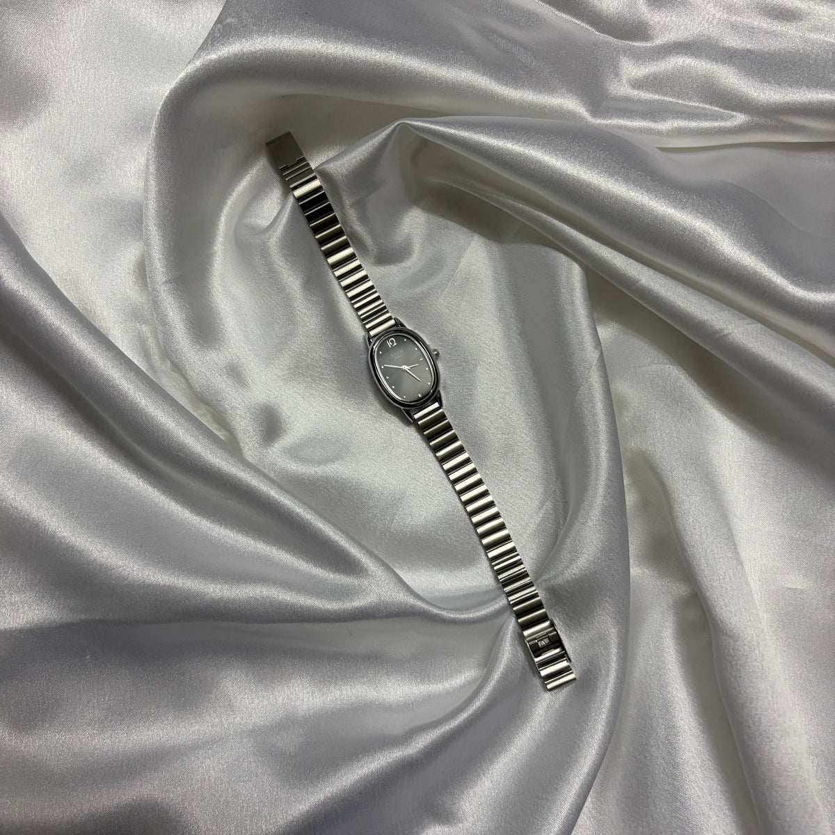 Silver Oval Dial Women's Watch with Stainless Steel Strap