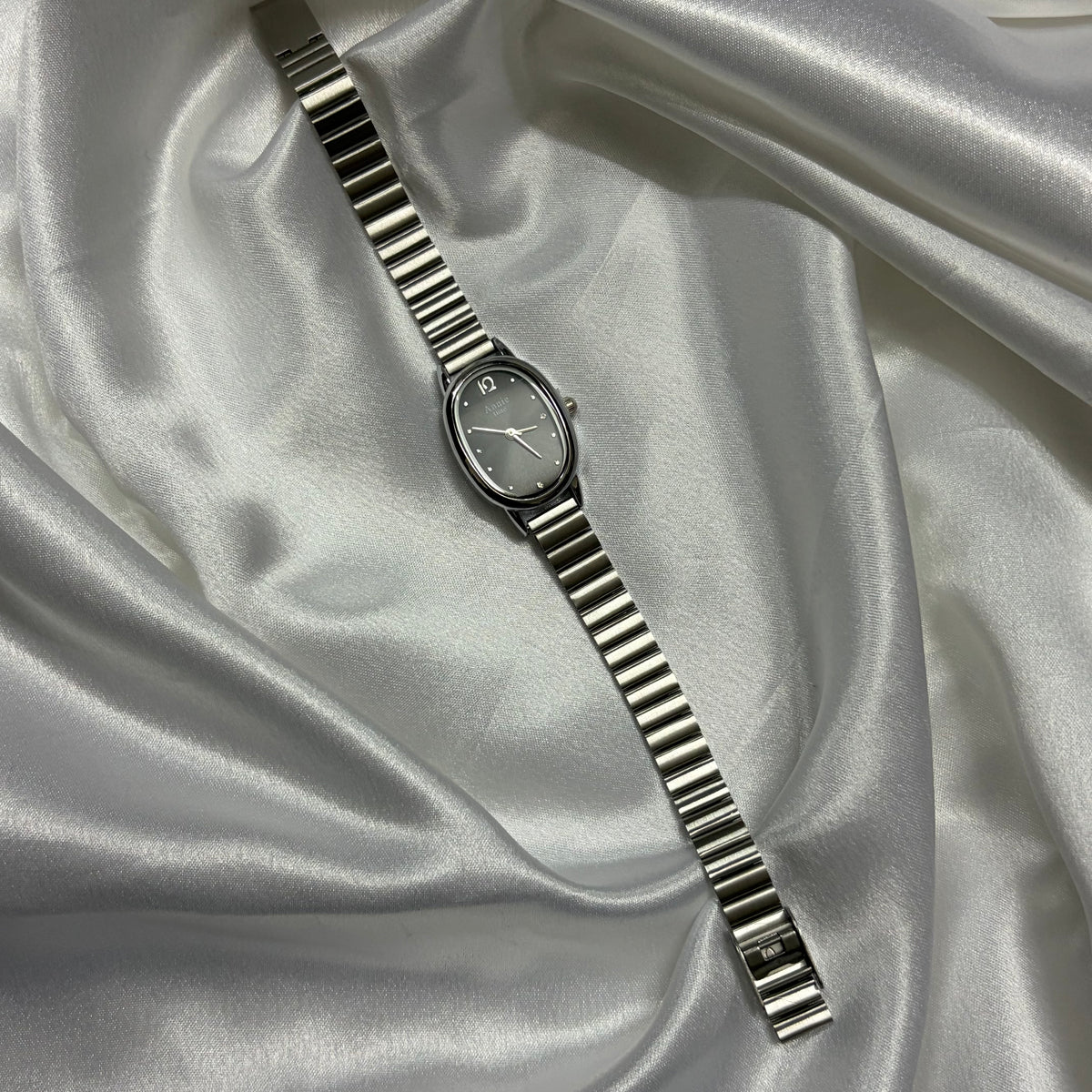 Silver Oval Dial Women's Watch with Stainless Steel Strap