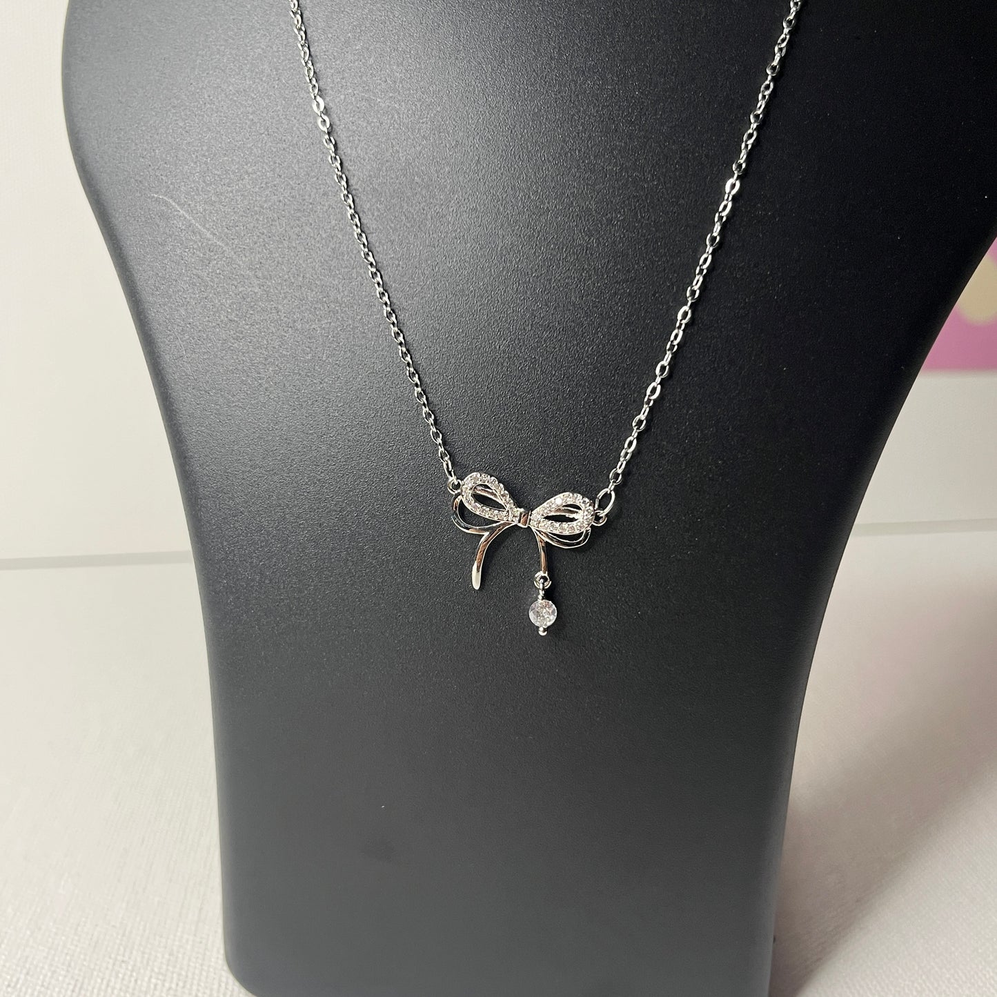 Silver Plated American Diamond Studded Infinity Bow Korean Pendant