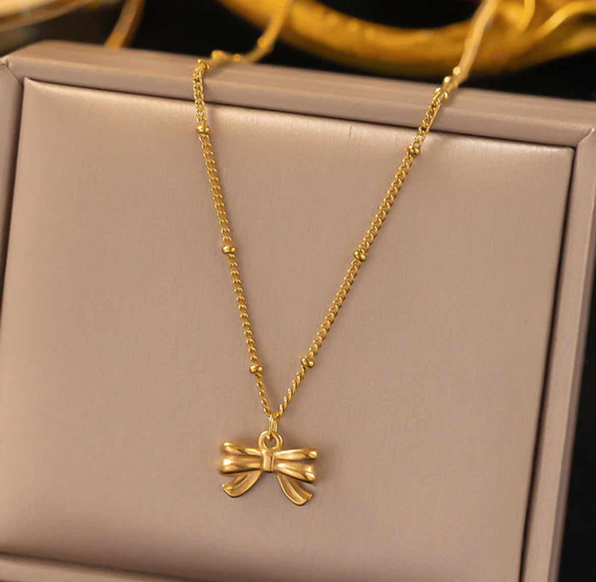 Gold Plated Stainless Steel Anti Tarnish Bow Themed Pendant