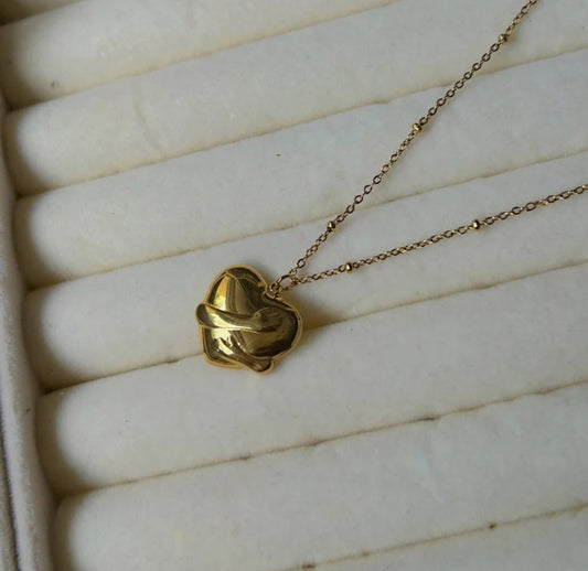 Viral Gold-Plated Anti Tarnish Heart Hug Themed Pendant